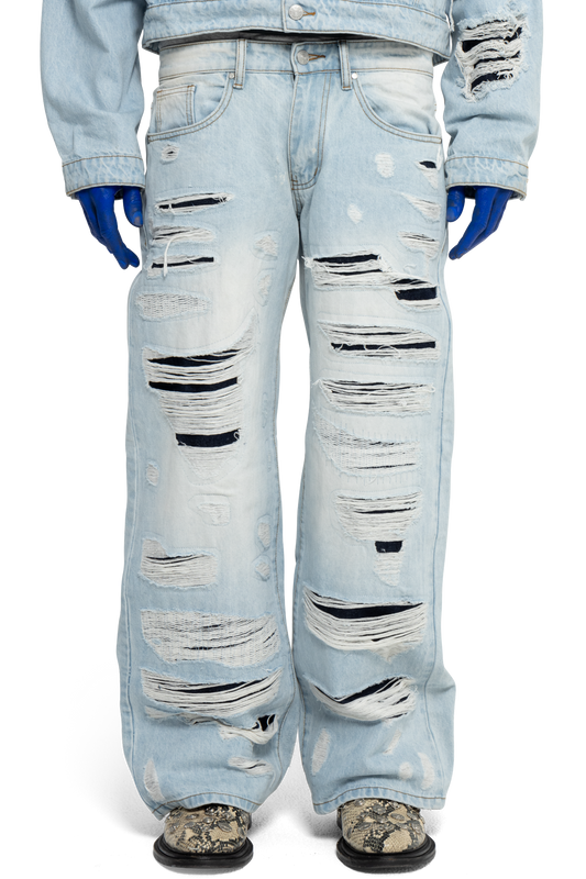 DISTRESSED DOUBLE DENIM PANTS